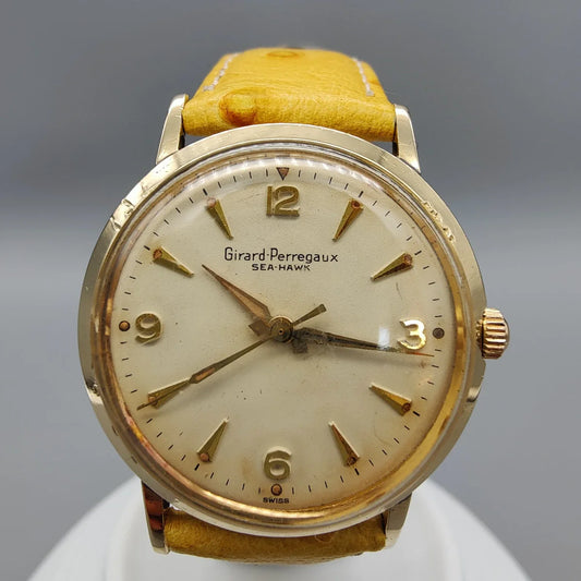 Cadran Girard-Perregaux Sea-Hawk vintage 1960, mouvement manuel, champagne. Détail photo montre rare.