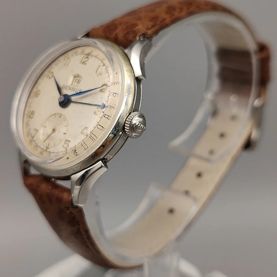 Couronne de la montre vintage Benrus Pointer Date 1950, 33mm, cadran argenté. Un classique du mouvement manuel.