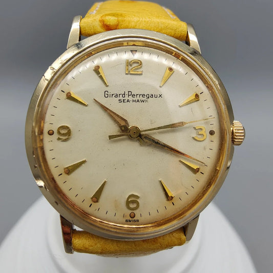 Boîtier Girard-Perregaux Sea-Hawk vintage 1960, mouvement manuel, cadran champagne.