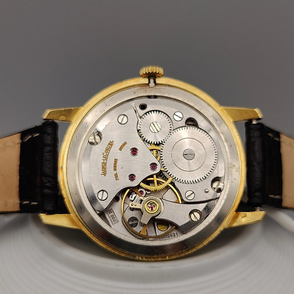 Jaeger-Lecoultre Classic Date 1970 vintage manual watch movement. Intricate mechanics, 34mm, argenté dial.