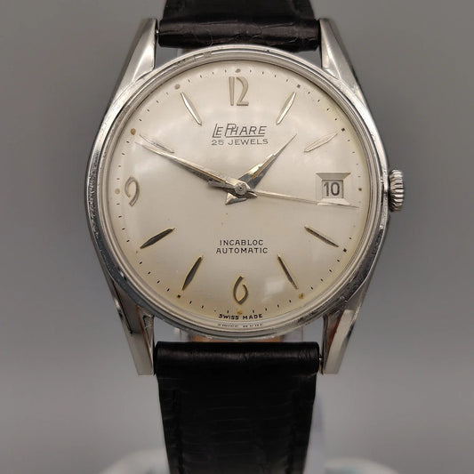 Cadran de la montre Le Phare Automatic Incabloc de 1965. Une montre automatique vintage au cadran champagne.