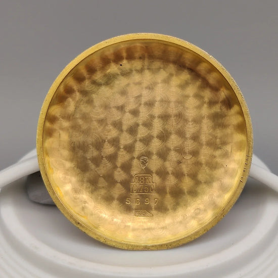 Montre Lemania Chronographe vintage 1955, cadran champagne. Superbe exemplaire pour passionnés de montres classiques.