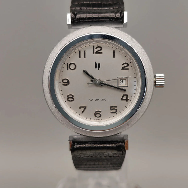 Vue boîtier montre vintage Lip Automatic 1972, mouvement automatique. Cadran argenté.