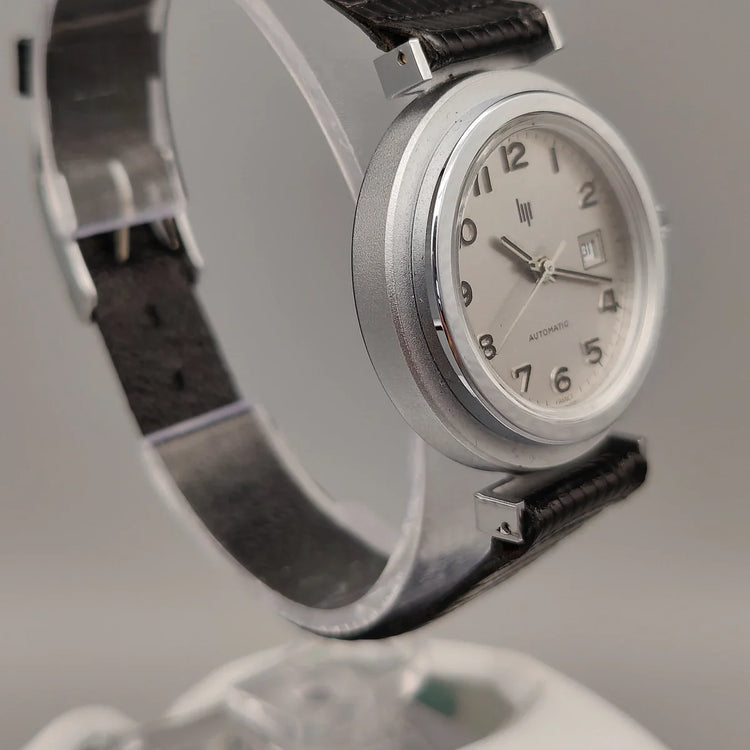 Montre Lip Automatic vintage de 1972, cadran argenté, vue de profil. Une pièce horlogère automatique iconique.