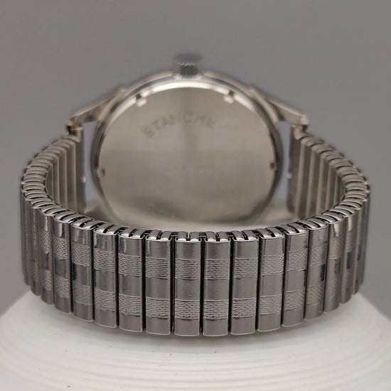 Montre automatique vintage Lov Aqua-Sport 1970, cadran gris champagne, vue de fond. Montre automatiques femme.