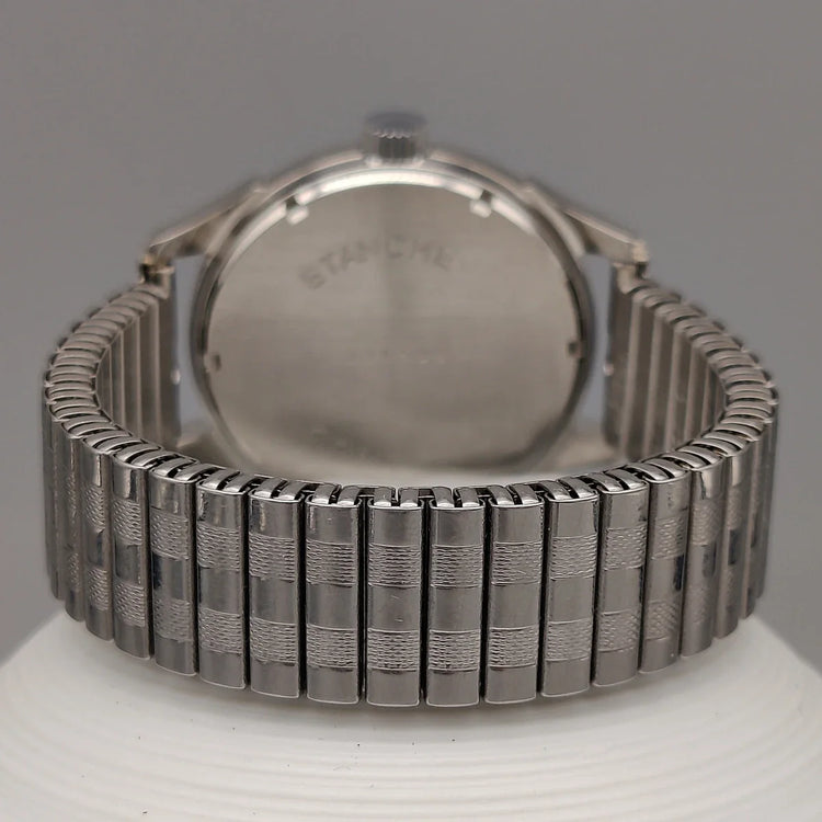 Montre automatique vintage Lov Aqua-Sport 1970, cadran gris champagne, vue de fond. Montre automatiques femme.