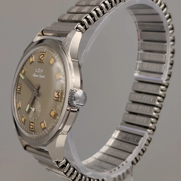 Montre automatique vintage Lov Aqua-Sport 1970 : vue détaillée de la couronne. Idéal pour collection femme.