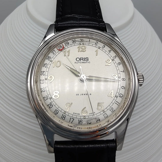 Cadran Oris Pointer-Date vintage 1997, couleur crème. Montre manuelle élégante, un classique pour femme.