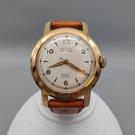 Boîtier de montre vintage Regor Precision 1950. Cadran crème/argenté, mouvement manuel.