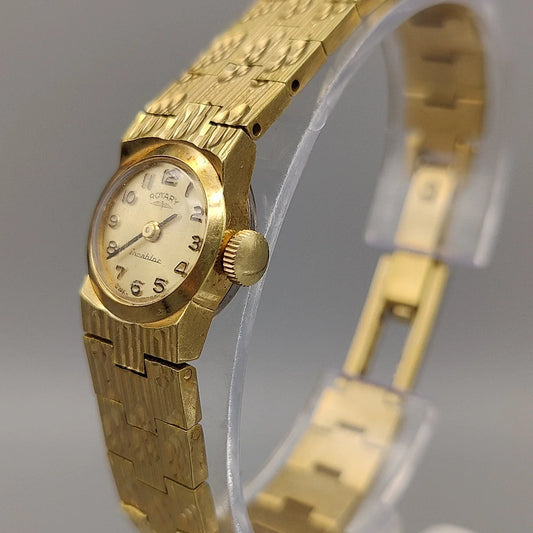 Couronne de montre vintage Rotary Incabloc 1970, mouvement manuel, cadran crème. Vue détaillée.