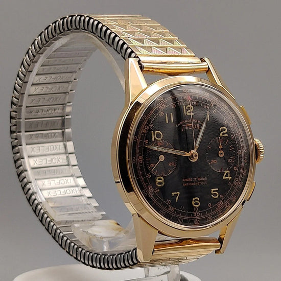 Couronne cannelée de la montre Telda Meangraf 660 FT vintage de 1950, mouvement manuel, cadran noir.