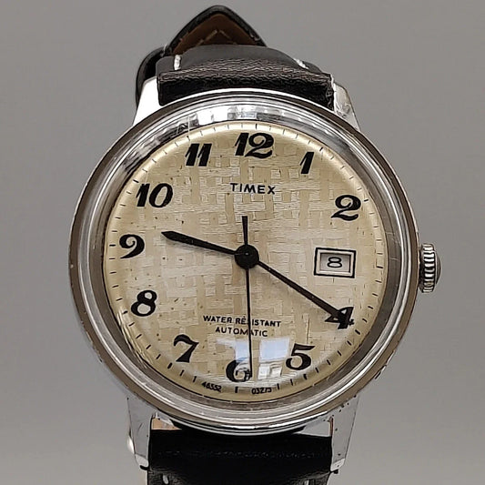 Cadran montre Timex Automatic Water Resistant 1973 vintage. Mouvement automatique, cadran champagne.
