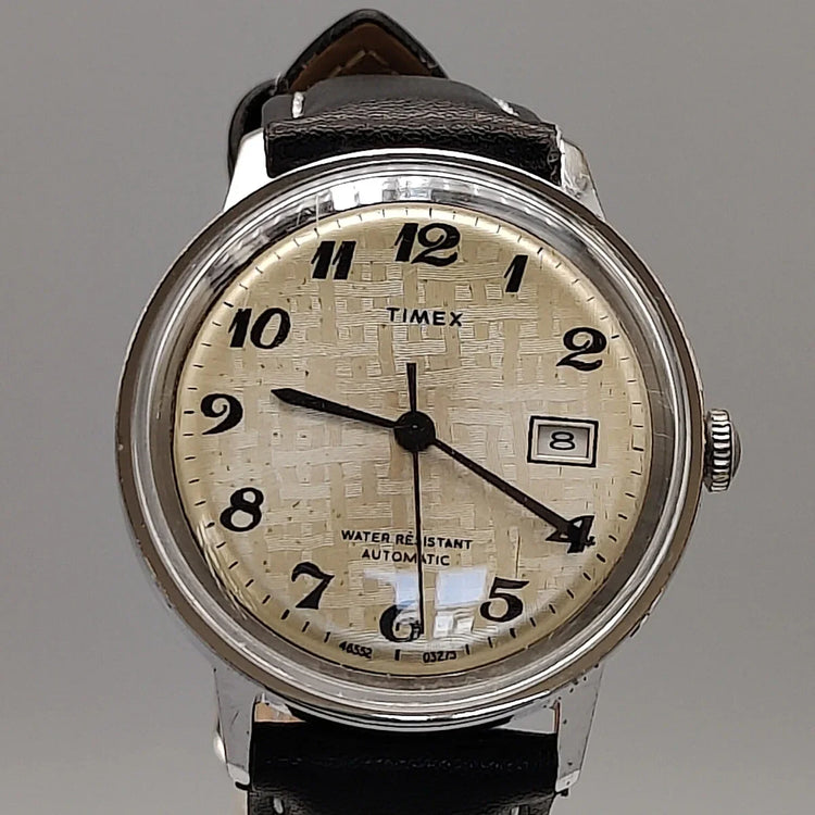 Cadran montre Timex Automatic Water Resistant 1973 vintage. Mouvement automatique, cadran champagne.